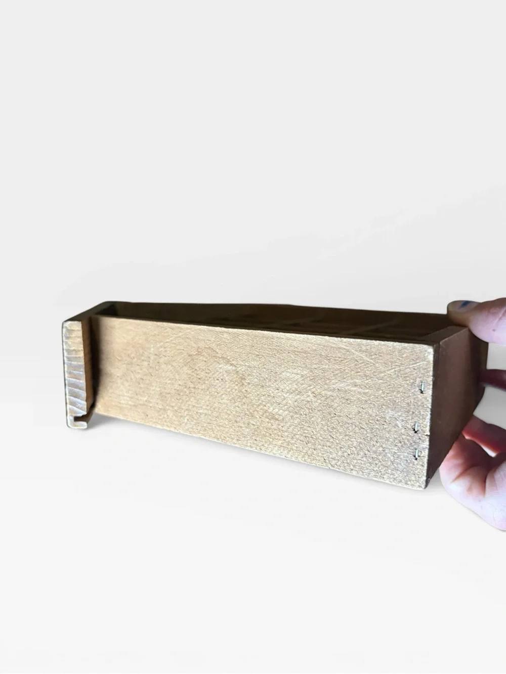 Small house trinket shelf hung by wire